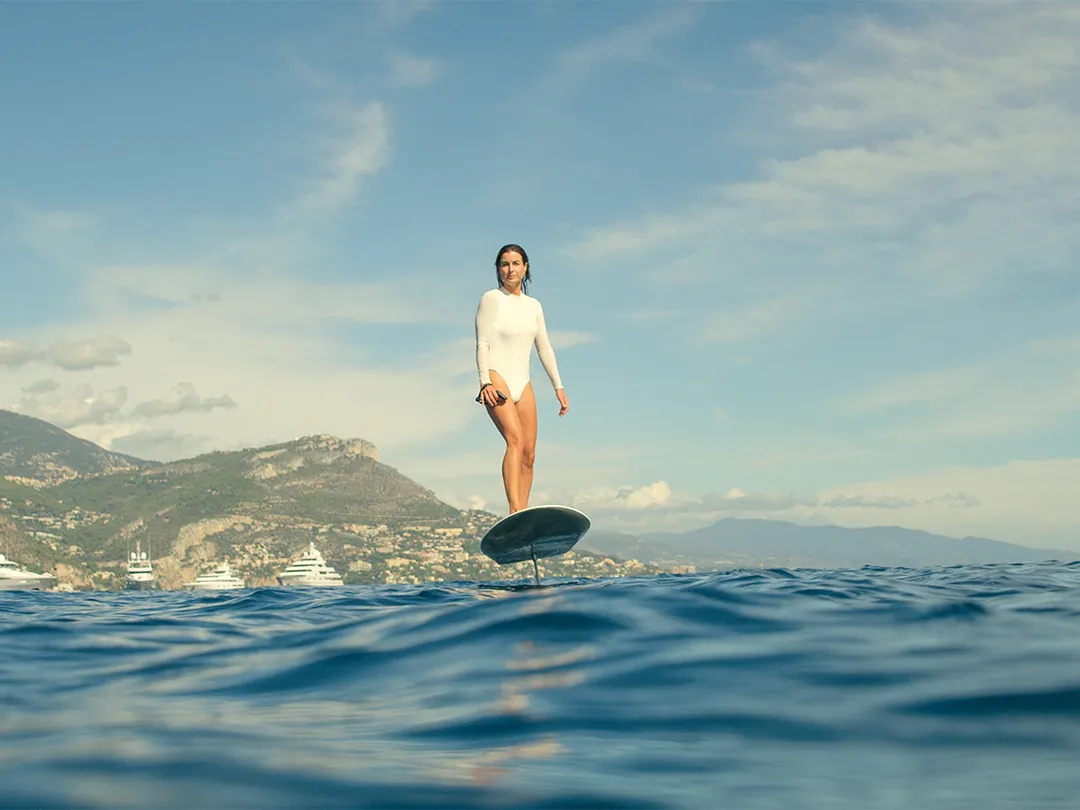 Superyacht charter guest riding a Fliteboard