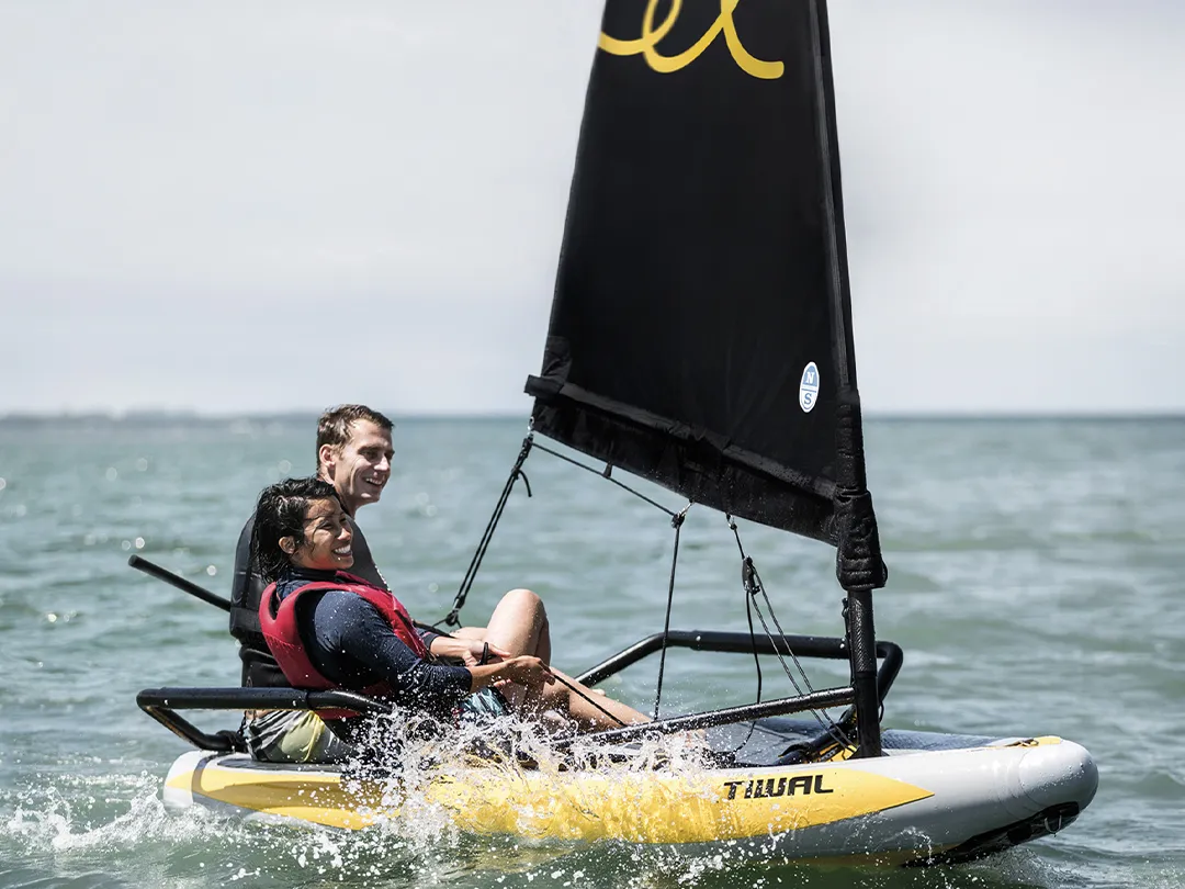 Charter guests from a superyacht enjoying Tiwal inflatable dinghy